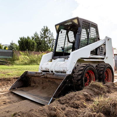 The Different Uses for Skid Steer Material Buckets