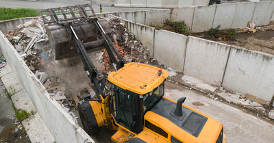 Replacing the Hydraulic Cylinder on a Skid Steer Grapple