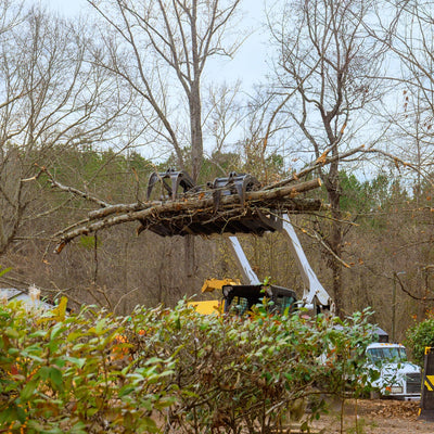 How Skid Steer Attachments Help With Storm Cleanup