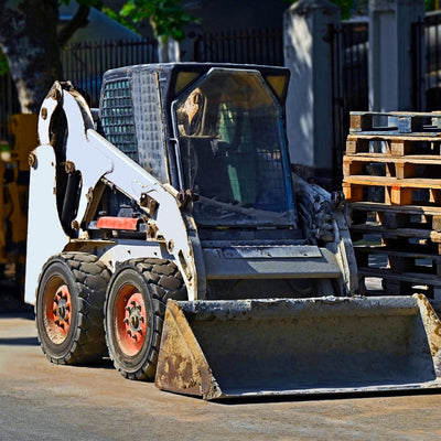 How To Safely Transport Skid Steer Attachments